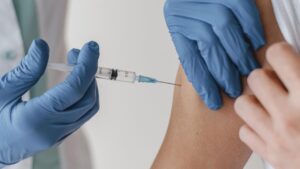 administración de vacuna