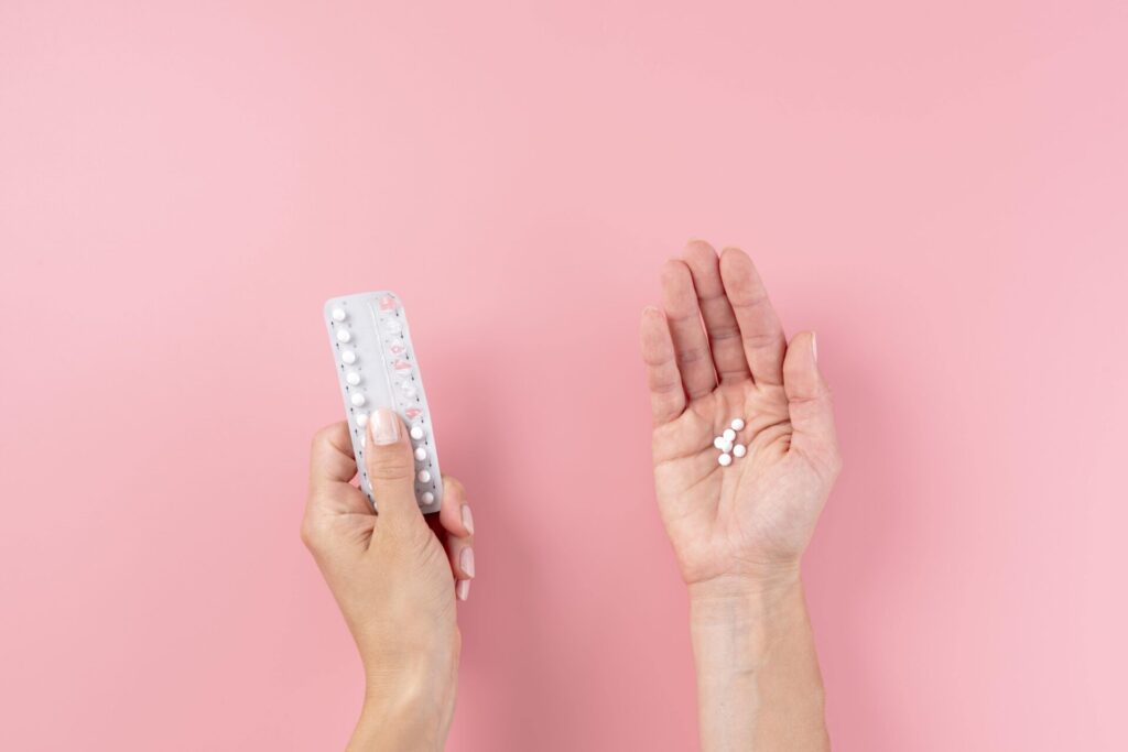 close up hands holding pills (1) min